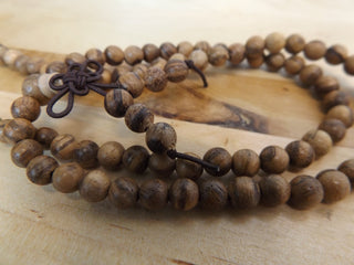 Wood (Bown Veined Wood) 6mm rounds *approx 108 beads.  (includes guru bead)