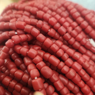 Indonesian Glass "Tube" beads.  approx 4 x 4mm.  24" strand.  Approx 150 Beads/ Strand.  *Opaque Red