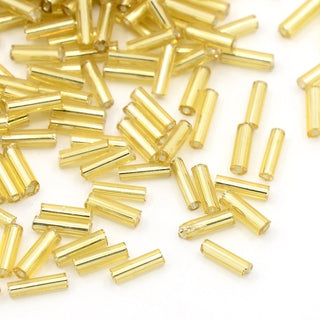 Glass Bugle Beads, Silver Lined, Light Gold Khaki, 6~8x1.8mm, Hole: 0.6mm.  Approx 15 Grams.