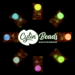 Cylin Bead.   11/0.    25g Bag.   Glow in Dark - AB Purple