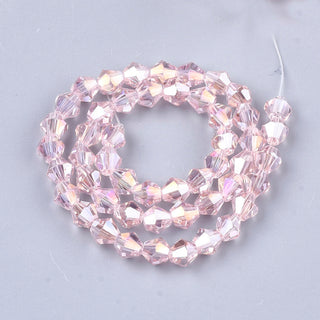 Bicone (Glass)  *Electroplated AB Plated Pearl Pink. 6mm size.  (approx 45 beads strand).
