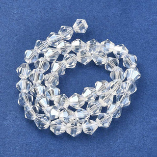 Bicone (Glass)  *Electroplate over Clear. 6mm size.  (approx 45 beads).