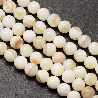 Natural Shell Beads.  6mm.  Round.  Creamy White Sand Color.  (Approx 60 Beads)