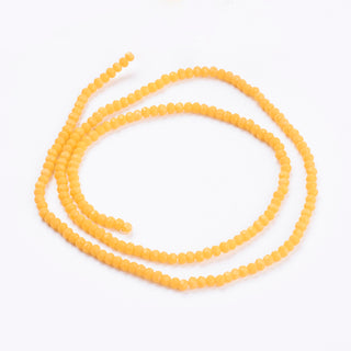 Crystal (Chinese) *Faceted Rondelle  (Opaque Yellow)   3 x 2mm.   Approx 185 Beads on an 18" Strand.