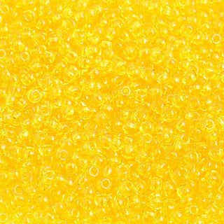 Czech 10/0 Seed Beads.  (Round).   Transparent Yellow.  (Strung.  Approx 23 grams)