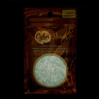 Cylin Bead.   11/0.    25g Bag.   Glow in Dark - AB Purple