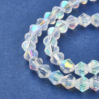 Bicone (Glass)  *Half AB Plated over Clear.  6mm size.  (approx 46 beads strand).