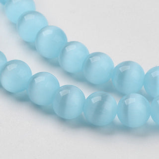 Cats Eye Glass Round Beads.  12mm.  Etherial Sky Blue.  Approx 16 Beads.