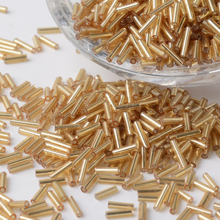 Silver Lined Glass Bugle Beads, Round Hole, Dark Goldenrod, 6~7x1.5~2mm, Hole: 0.5mm. Approx 15 Grams