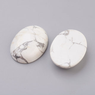 Cabochon.  White Howlite.  Oval 30 x 40mm approx.   Sold Individually.