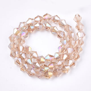 Bicone Beads Faceted.  Glass 8mm.   (Light Salmon with AB Finish).   (Approx 40 Beads)