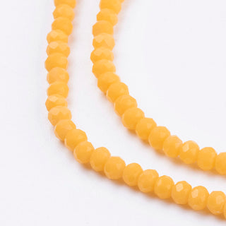 Crystal (Chinese) *Faceted Rondelle  (Opaque Yellow)   3 x 2mm.   Approx 185 Beads on an 18" Strand.