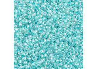 Czech 10/0 Seed Beads.  (Round).  C/L Turquoise  (Strung.  Approx 23 grams)
