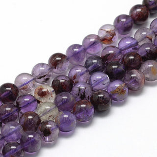 Rutilated Quartz (Natural Purples) 8mm Rounds.  16" Strand (approx 52 Beads)