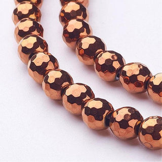 Hematite (Non Magnetic).  4mm Faceted.  Round.  Red Copper Color (Vacuum Plated). *approx 100 Beads.