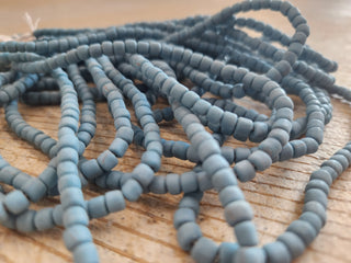 Indonesian Glass "Tube" beads.  approx 4 x 4mm.  24" strand.  Approx 150 Beads/ Strand.  *Matte Pale Blue