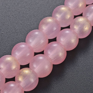 Glass  Rounds *Soft Gold Glitter on Pink.  Rounds 8mm (16" Strand approx 60 beads)