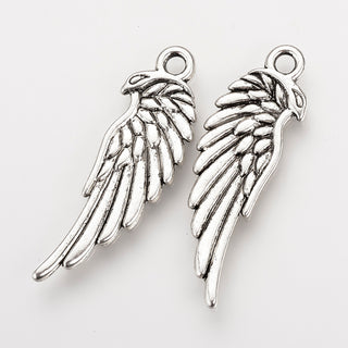 Bird (Wing).  33 x 10.5 x 2mm.  Metal.  Silver Color.   Sold individually.