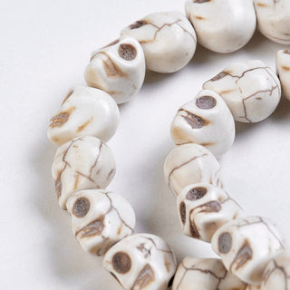 Howlite Skulls (Cream Color)  (16 inch Strand. 12 x 9 mm beads ) *approx 32 Beads