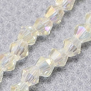Bicone. Electroplated Full Plating over Soft Yellow, Faceted, 3mm x3.5mm, Hole: 1mm; about 150pcs/strand, 18"
