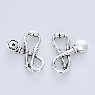 Charm,  Stethoscope, Antique Silver Size: about 22.5mm long, 18mm wide, 3mm thick, hole: 5x8mm.  (See Drop Down for Package Options)