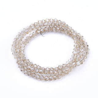 Bicone. Electroplated Rainbow Plating over Clear, Faceted, 3mm x3.5mm, Hole: 1mm; about 150pcs/strand, 18"