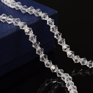 Bicone Beads Faceted.  Clear (4 x 4mm)  (approx 82 beads on a 14" strand)