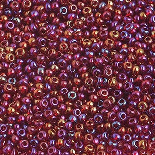Czech 10/0 Seed Beads.  (Round).  Tr. Iris Red.  (Strung.  Approx 23 grams)