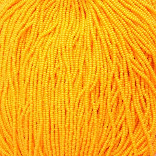 10/0 Seed Beads.  (Round).  Opaque Light Orange.  (Strung.  Approx 23 grams)