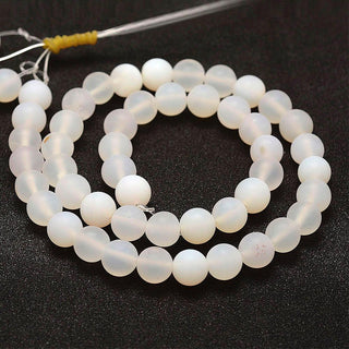 Agate  *Frosted.  (8mm rounds) 15.5" strand.  approx 43 beads.  *Natural White