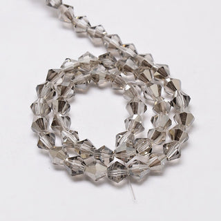 Bicone Beads Faceted.  Light Grey (4 x 4mm).  (Approx 95 Beads/strand).
