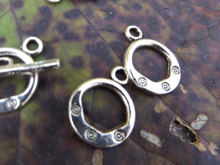 Toggle Clasp(s) w/ detailed impressions.  Circle  15x18mm  (packed 3 or Bulk) - Mhai O' Mhai Beads
 - 2