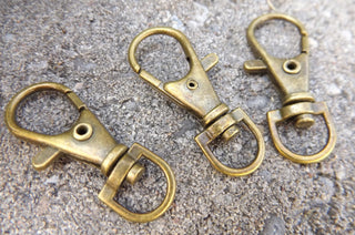 Swivel Clasp (Lobster Clasp Style)  13x35mm with 15mm hole.  See Drop Down for Options and Finishes - Mhai O' Mhai Beads
 - 7