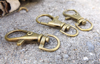 Swivel Clasp (Lobster Clasp Style)  13x35mm with 15mm hole.  See Drop Down for Options and Finishes - Mhai O' Mhai Beads
 - 8