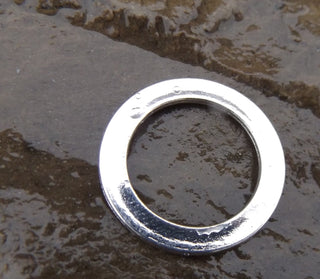 Tibetan Style Rings (PACKED 10). *17 mm diam.  5 mm ring depth.  1mm thick.  Center Hole 9mm - Mhai O' Mhai Beads
 - 1