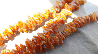 Amber (Natural) Chips.  15" strand.  5 to approx 9mm size chips - Mhai O' Mhai Beads
 - 1