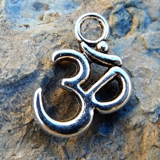 Charm (OHM) 16 x 11mm.  Antique Silver Color.  See Drop Down for pack size. - Mhai O' Mhai Beads
 - 1