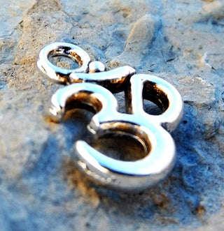 Charm (OHM) 16 x 11mm.  Antique Silver Color.  See Drop Down for pack size. - Mhai O' Mhai Beads
 - 2
