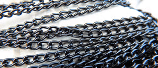 Chain (Aluminum Twisted Curb Chain.  Oxidated in a True Black.   4 x 5.2mm.  Sold by the Foot. - Mhai O' Mhai Beads
 - 1