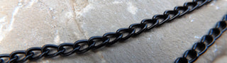 Chain (Aluminum Twisted Curb Chain.  Oxidated in a True Black.   4 x 5.2mm.  Sold by the Foot. - Mhai O' Mhai Beads
 - 2