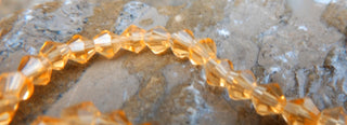 Crystal Bicone Trans Gold 4x4mm (approx 83 beads per 13" strand). - Mhai O' Mhai Beads
 - 2