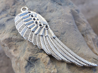 Metal Charm -(Single Wing) (WNGBBS18)  Single Wing Silver Color (50 x 18mm) with loop.  See Drop down for options - Mhai O' Mhai Beads
 - 1
