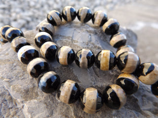 Agate *Black with Tan Band.   (Round 10mm) *16 inch strand.  (Faceted) - Mhai O' Mhai Beads
 - 1