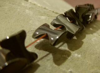 Hematite (Bow (stacking) Shaped Beads) 10 x 8mm Size.   Approx 105 Beads per 16" Strand