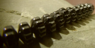 Hematite (Cogs) 8mm Diam (Non Magnetic)  15" Strand (approx 88 Beads)