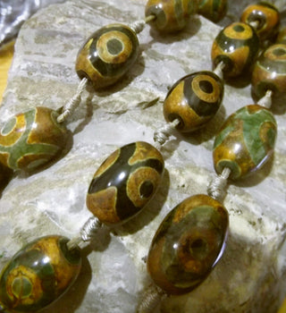 Dzi Agate (Barrell Beads) *Olive and Brown (20-24mm x 14-16mm).  *approx 12 beads per strand