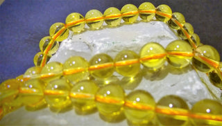 Citrine (AA) Rounds.  See drop down for size options.  (16" Strand)