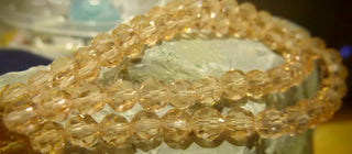 6mm Faceted Round Crystals *Buff Buff  (approx 90 beads per 20" Strand)