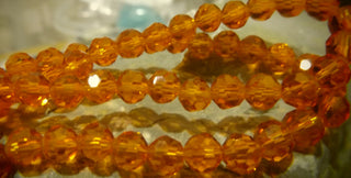 6mm Faceted Round Crystals *Orange  (approx 90 beads per 20" Strand)