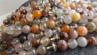 Rutilated Quartz (Natural Mix Colors) 8mm Rounds.  16" Strand (approx 52 Beads)